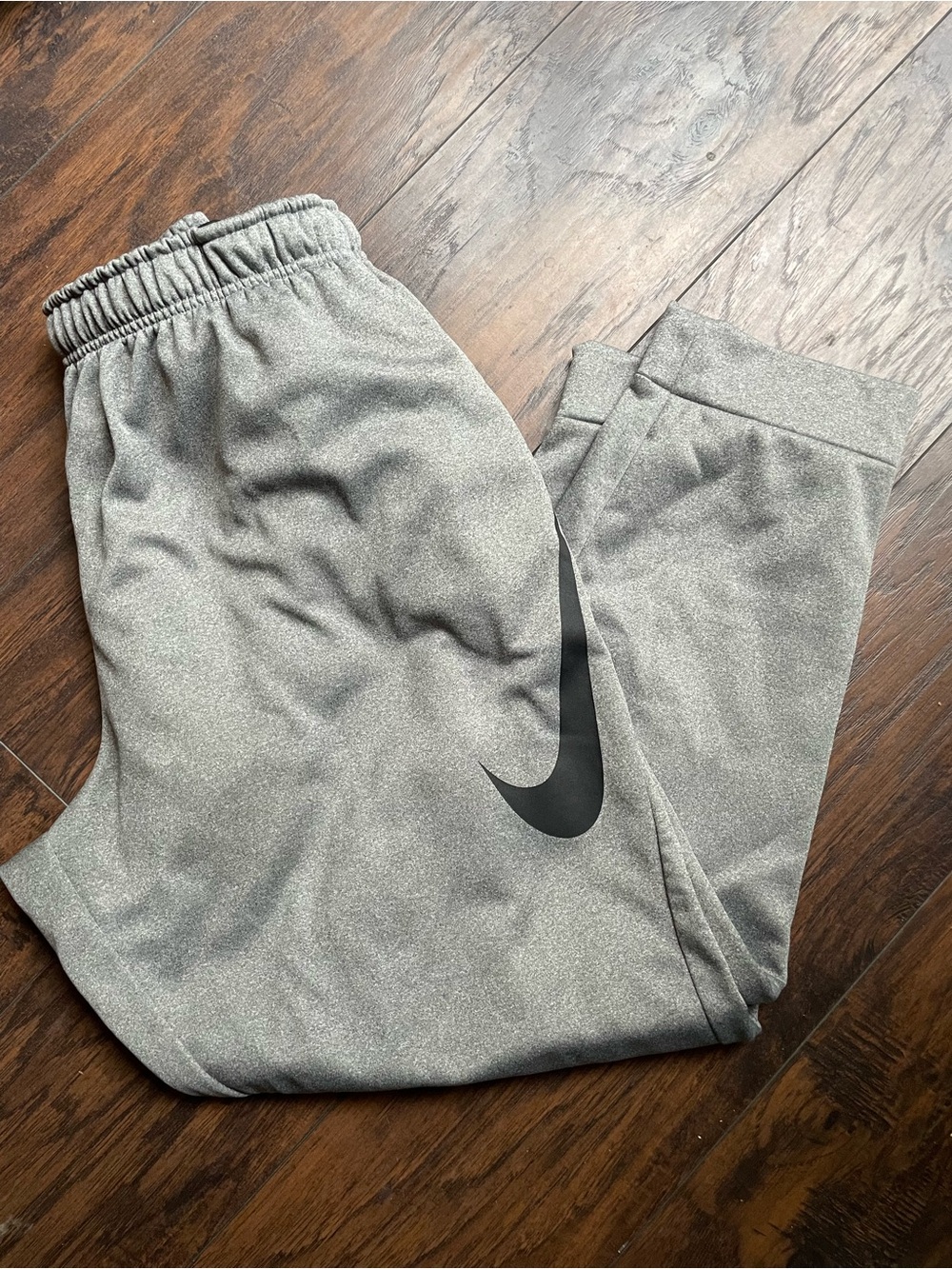 Nike Men's Grey Athletic Jogger Pants with Black Swoosh